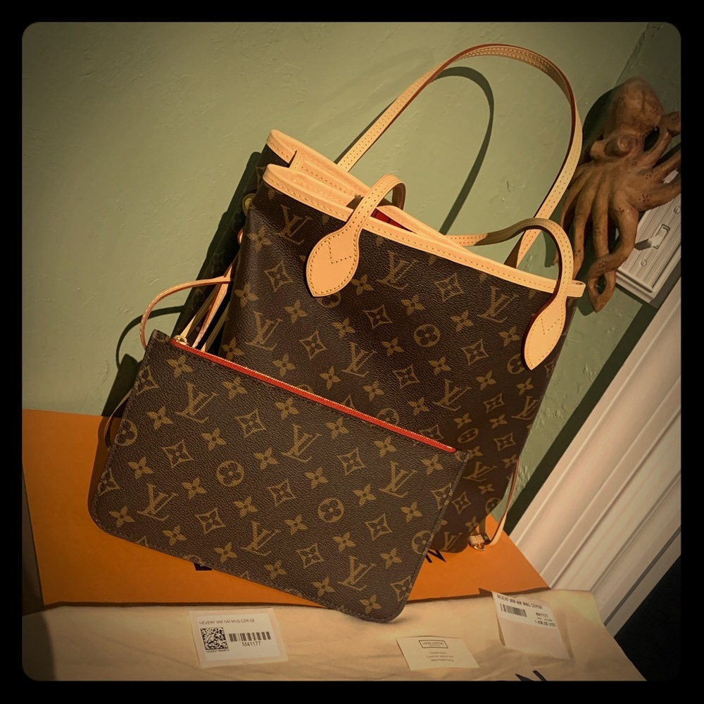 Louis Vuitton purse with small clutch zipper bag